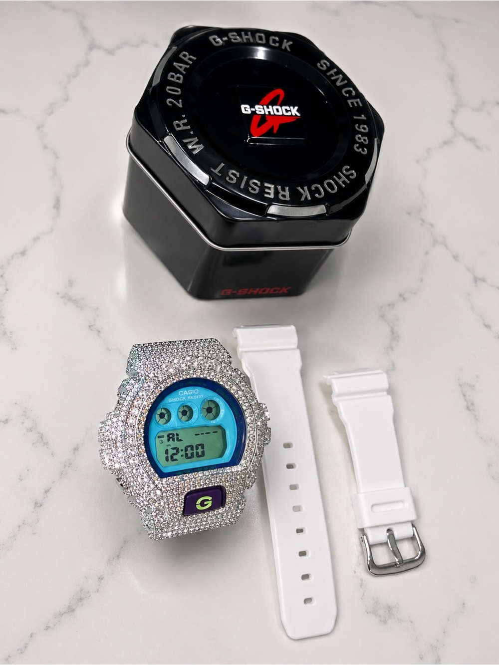 G-Shock White Watch with Silver Crystal-Encrusted Bezel and Blue Display